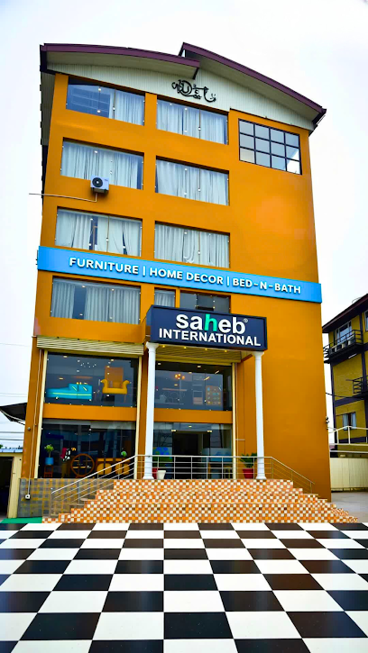 Saheb International Logo